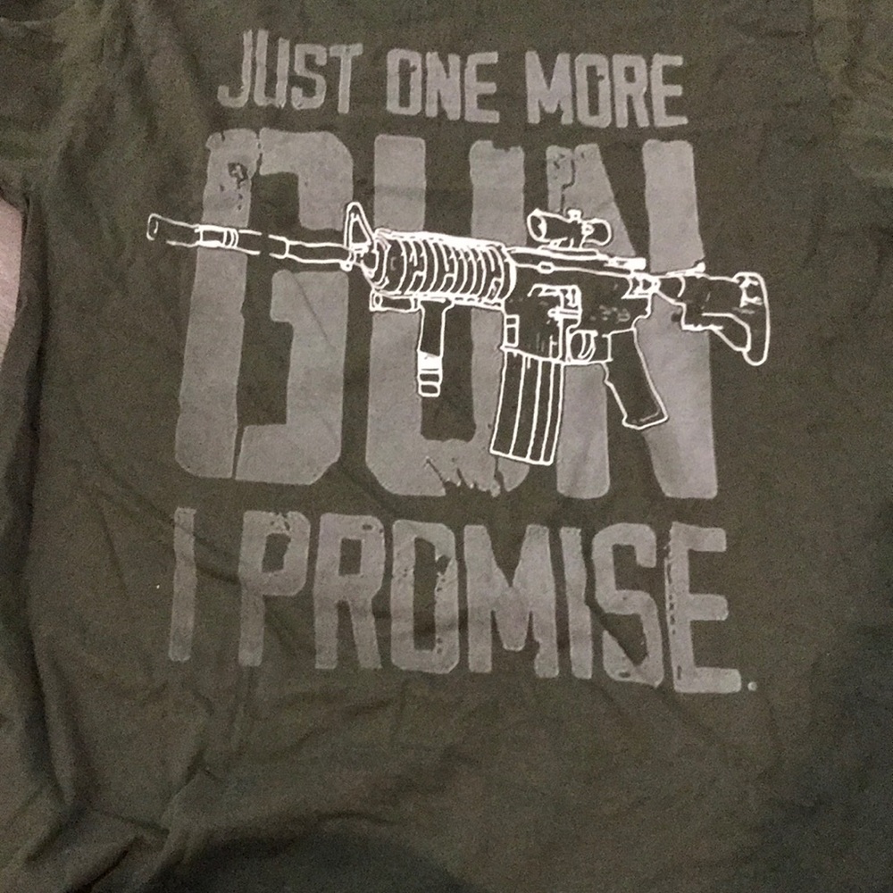 Green shirt about guns